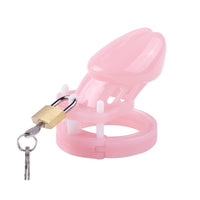 Embrace your sissy side with our mini male pink cage. This locking device strips away masculinity, making you feel like a cute bunny or playful pig. With its tail accessory, losing control has never been so fun!