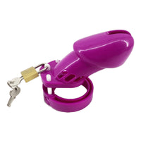 Unleash submission with the Denial In Purple cage; a magenta fortress for sissies. Demonstrate devotion while maintaining hygiene with adjustable rings and discreet vents.