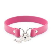 Elevate your style with our luxurious leather collar featuring a heart-shaped padlock. This stunning accessory wears beautifully, adding an edgy touch to any outfit. Whether you're flying off to new adventures or embracing the everyday, even those still in diapers can appreciate its charm!