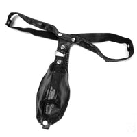 Embrace bold intimacy with this Black Low Waist G-String belt a trap dick chastity belt male that allows daring style. Crafted from vegan leather and polyester, its inward string design cups you snugly like a sock, leaving your anus provocatively exposed.