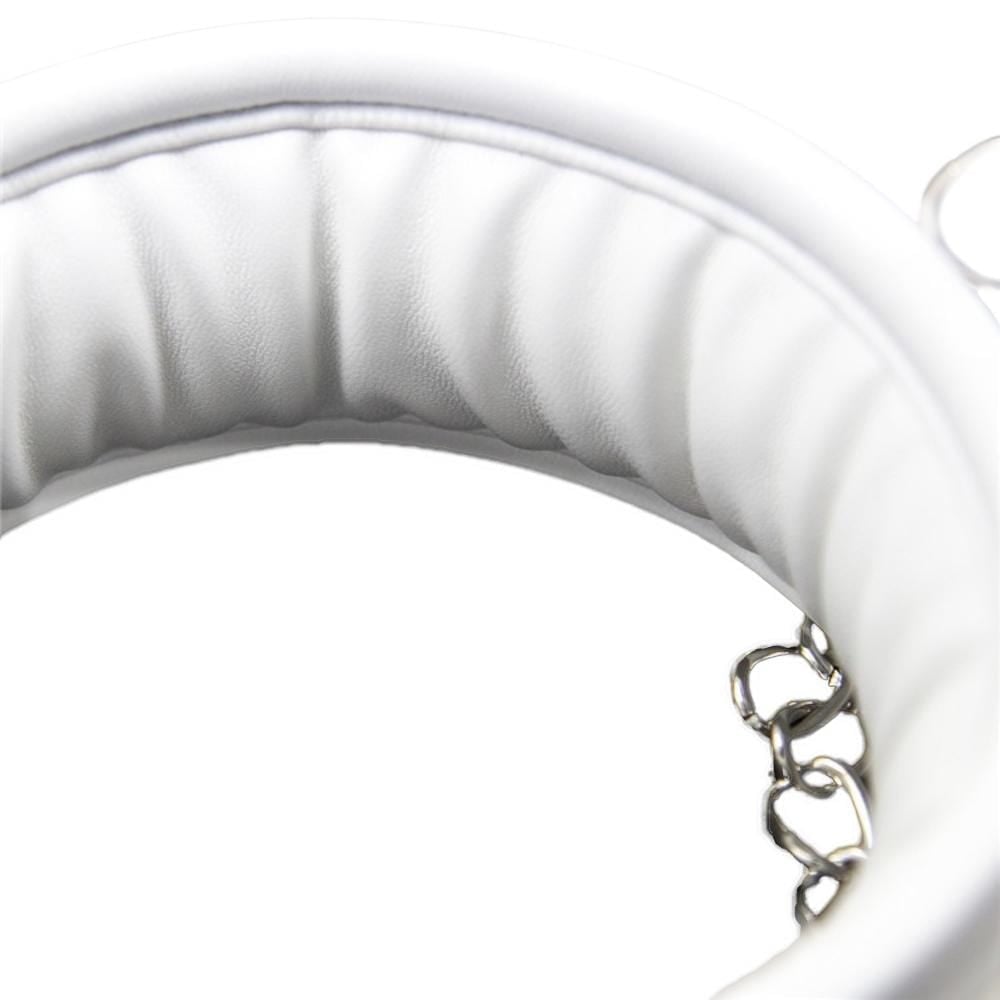 Ended your shopping spree? Don't get mad make a brutal shift in your BDSM play with our elegant white vegan leather collar and leash. Adjustable and stylish, it's perfect for adding flair to your sessions.