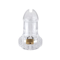 Max's mistress takes control to another level with this transparent plastic cage, a non-metal solution for their dynamic. With five rings, it's a perfect fit, even when in public. Laughs and devotion ensured.