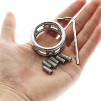 Experience extreme control with our device spiked cage; its duct-like grip, like rubber wrapping, pops your submissive's boundaries. Adjustable spikes intensify pain, teasing every urge.