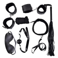 Get tied up in passion with our Playful Mistress 7-Piece Bondage Set. Ignite the tinder of desire, blindfold your lover with the eye mask, quote their deepest fantasies, and weave a web of pleasure like a spider.