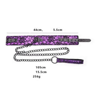 Elevate your dominatrix experience with the Mistress Chastity Purple Collar With Leash. Crafted from strong synthetic leather, this adjustable collar empowers you to enhance the psychological connection with your sub, giving you the power to lead and control.