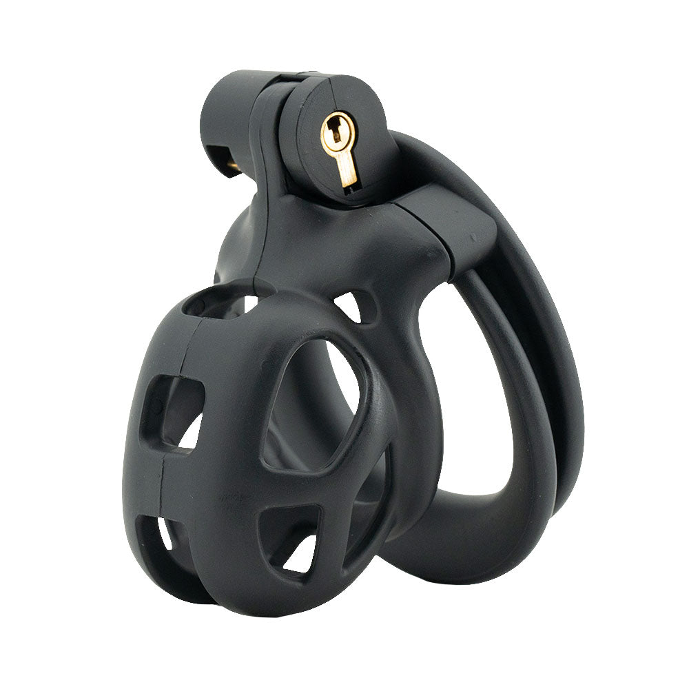 Unlock a new realm of control with the Dark Cobra Male cage. This sleek device crowns your experience, secured with a discreet screw. Its innovative design features thorn-like textures, preventing bigger distractions and embodying the stealth of a cobra.